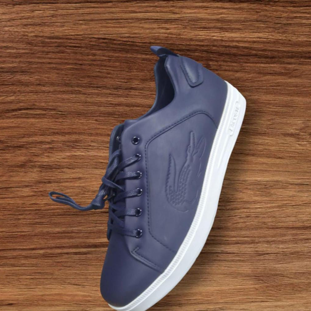 Lacoste Noir Elite – Embossed Leather Sneakers for a Bold Statement